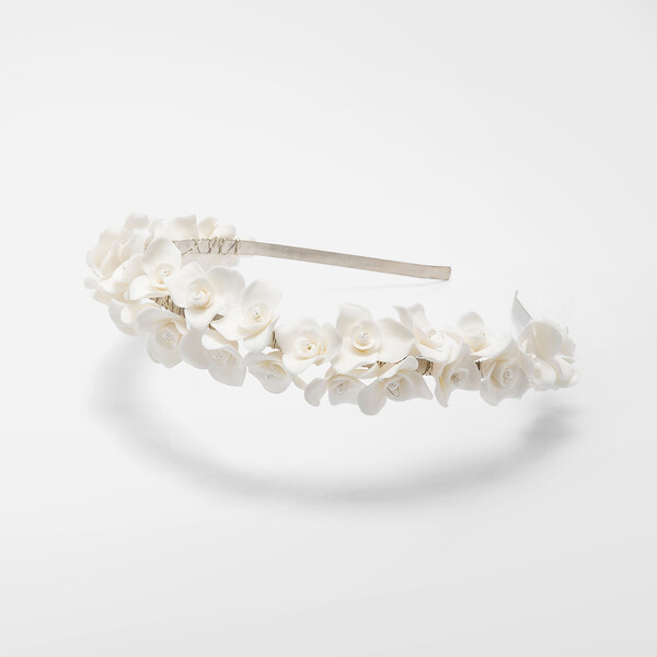 Cerchietto con fiori in porcellana bianchi